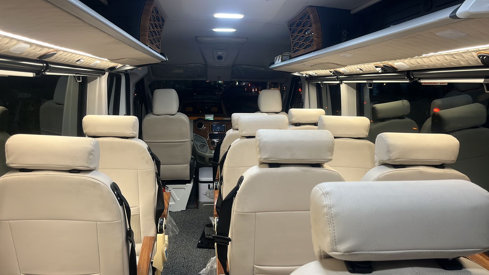 Spacious cabin aisle of the Tempo Traveller