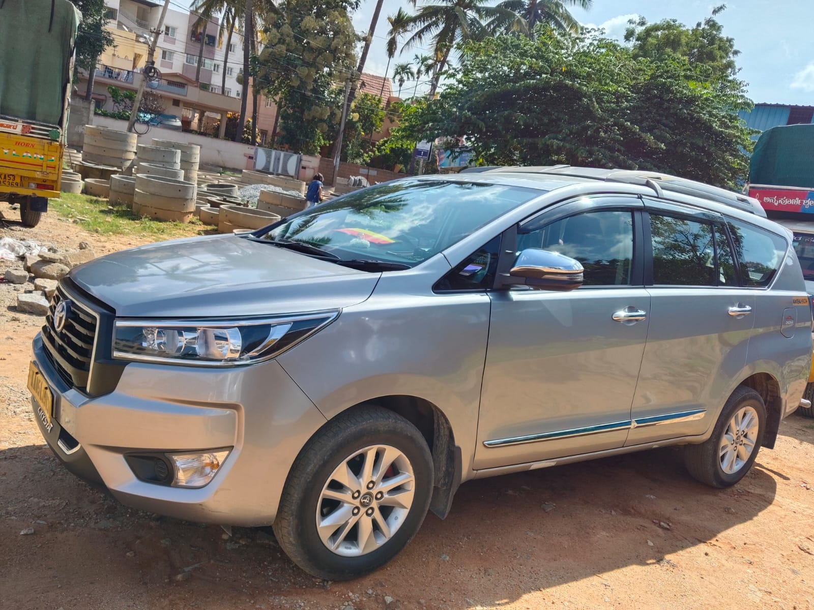 Innova Crysta rear three-quarter view