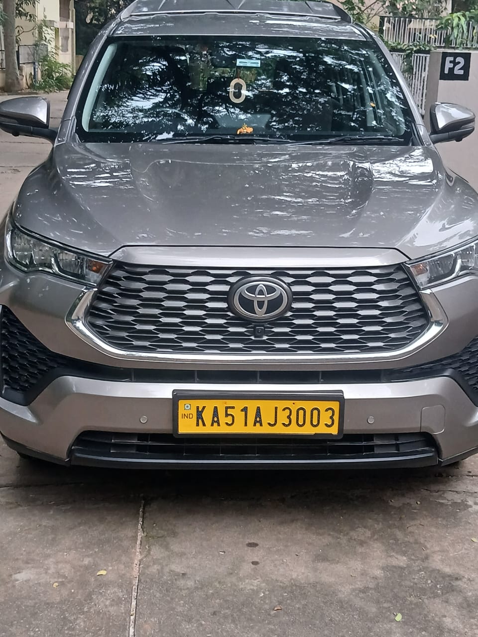 Spacious rear passenger seats of our Innova